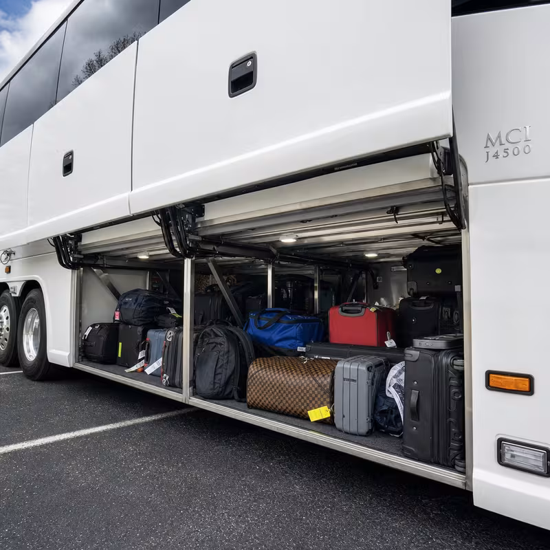 Party bus interior with wraparound leather seating and LED lighting in Aurora