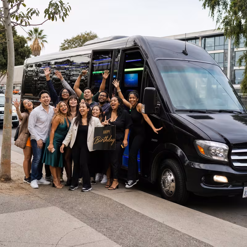 Party bus interior with wraparound leather seating and LED lighting in Aurora