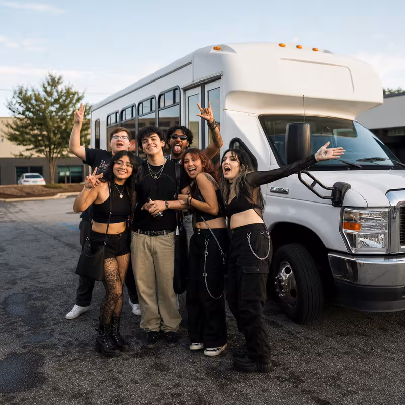 Black Mercedes Sprinter van staged for an Aurora Concert Transportation group