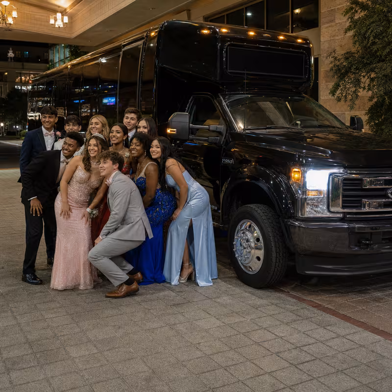 Party bus interior with wraparound leather seating and LED lighting in Aurora