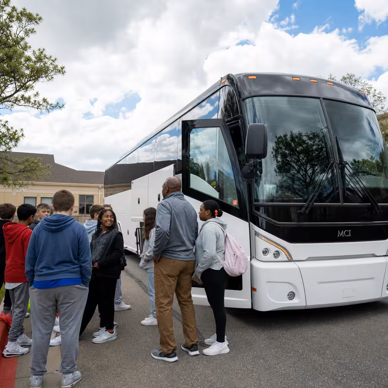 Black Mercedes Sprinter van staged for an Aurora School Transportation group