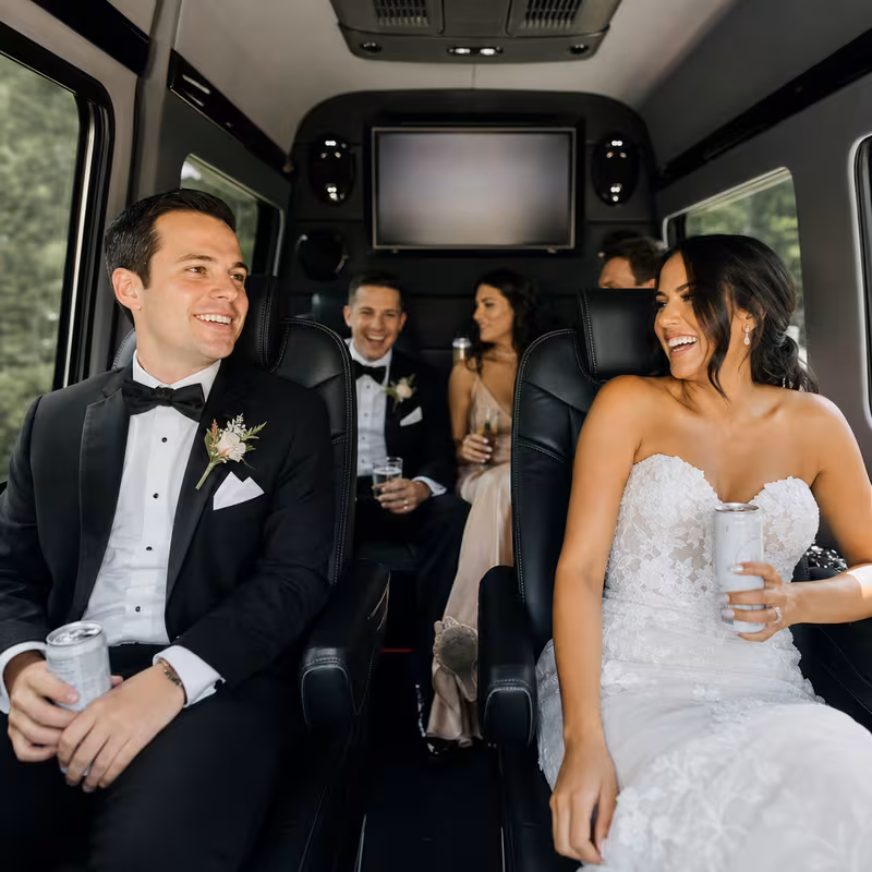 Black Mercedes Sprinter van staged for an Aurora Wedding Transportation group